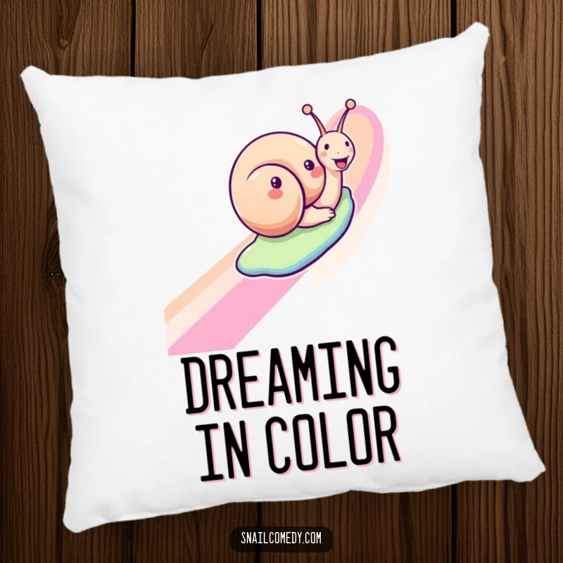 Funny snail pillow with a joyful snail sliding down a rainbow, a soft and humorous decorative accent for any room.