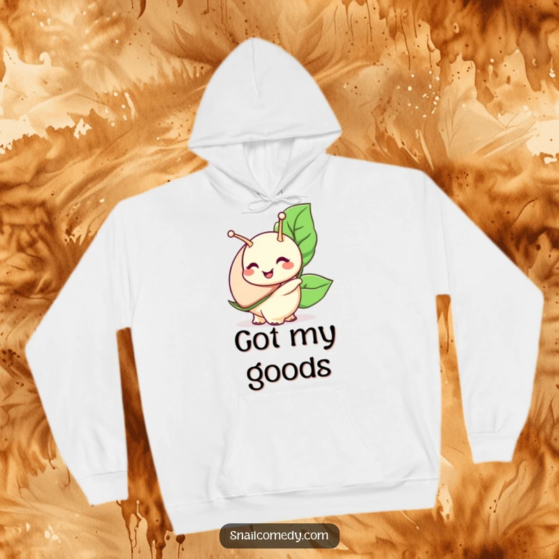 Funny snail hoodie, a snail character with a wide smile carries a large leaf, offering cozy comfort.