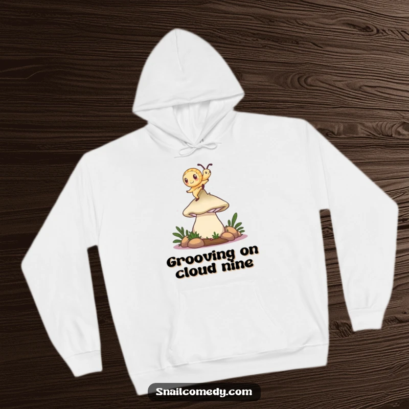 Funny snail hoodie featuring a snail dancing on a mushroom cap, a warm and fun piece of apparel.