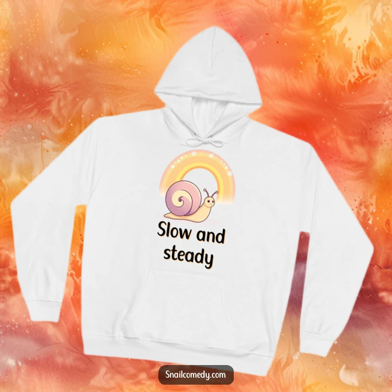 Funny happy snail character admiring an oversized, shimmering rainbow, soft hoodie, perfect for cozy days.