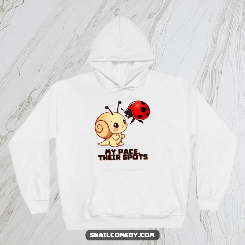 Funny hoodie with a curious snail character examining a ladybug with wonder, ideal for comfortable and thoughtful wear.