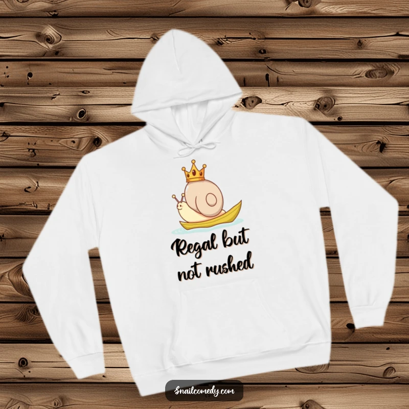 Funny Snail Hoodie showcasing a snail adorned with a small crown, navigating a leaf boat, perfect for comfortable, whimsical wear.