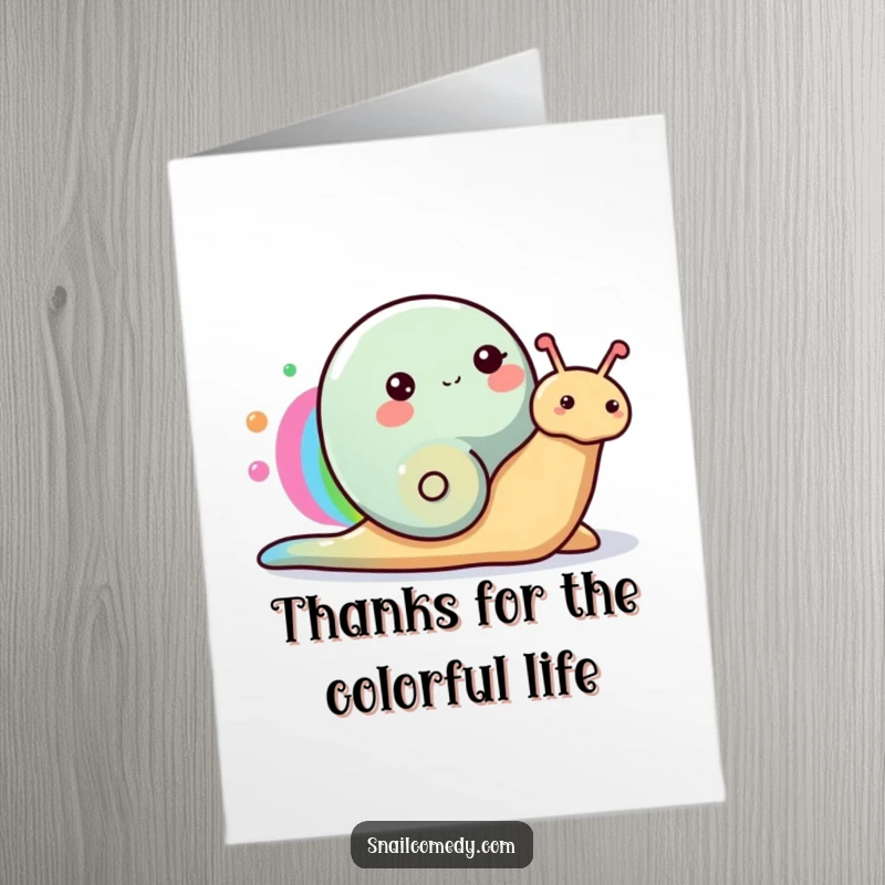 Funny Free Printable Thank You Card: A happy snail leaves a vibrant slime trail, painting a beautiful rainbow to express sincere gratitude.