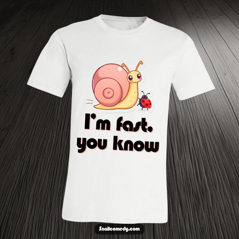 Funny t-shirt showcasing a snail character enthusiastically racing a tiny ladybug, a humorous depiction of speed.