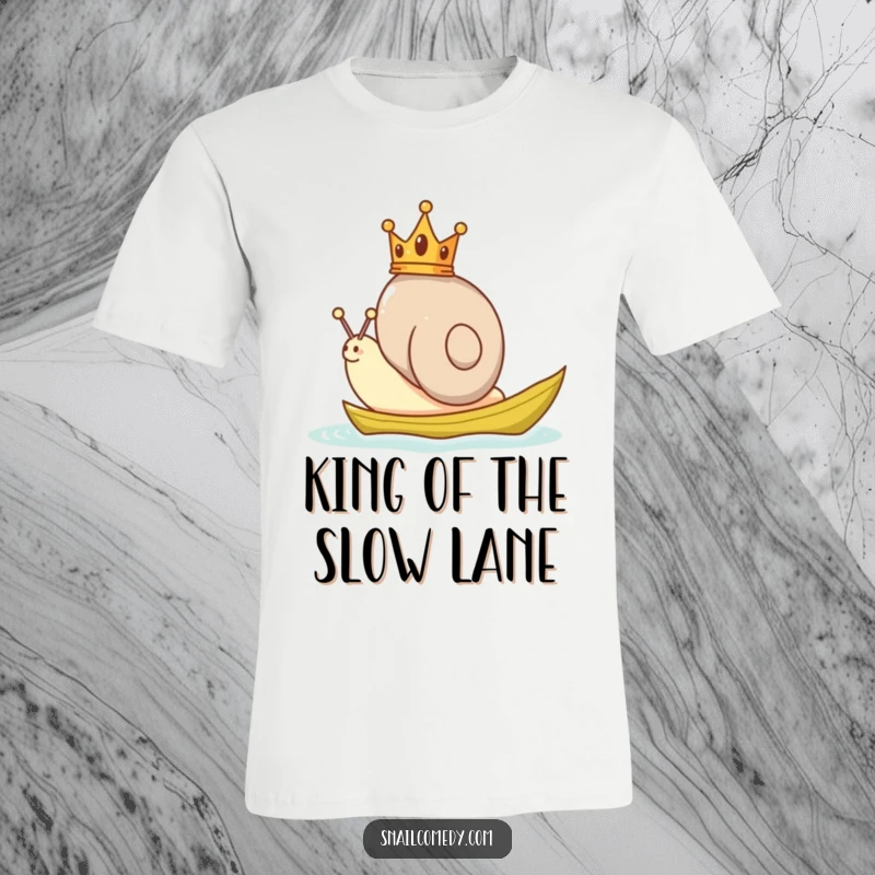 Funny Snail T-Shirt depicting a happy snail with a tiny crown, joyfully sailing across water on a vibrant green leaf.