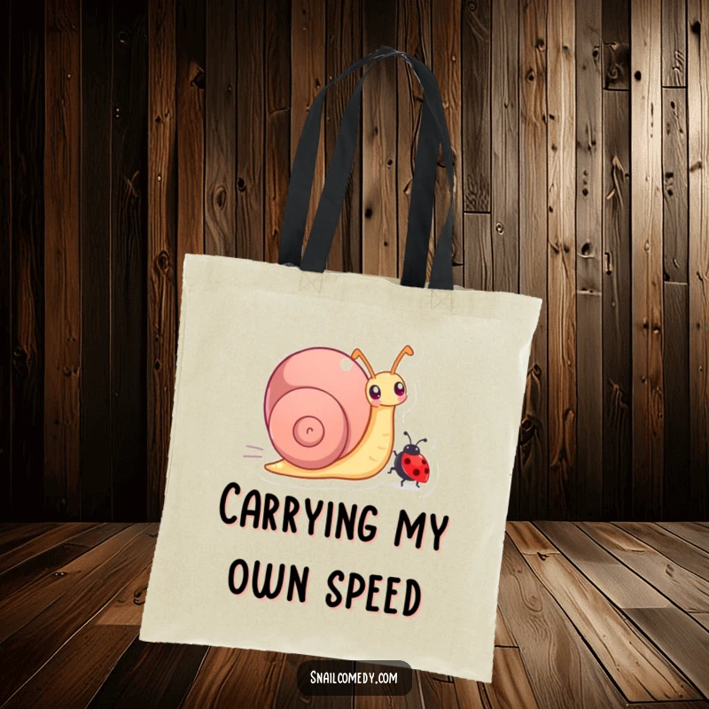 Funny tote bag depicting a snail character joyfully racing a tiny ladybug, great for carrying essentials with humor.