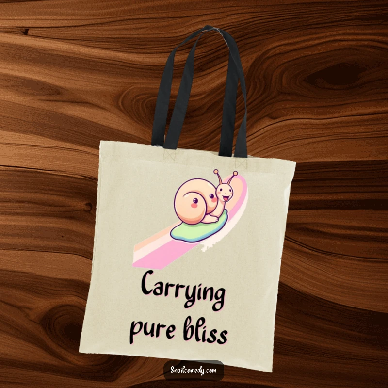 Funny snail tote bag with a joyful snail sliding down a rainbow, perfect for carrying essentials with a cheerful touch.